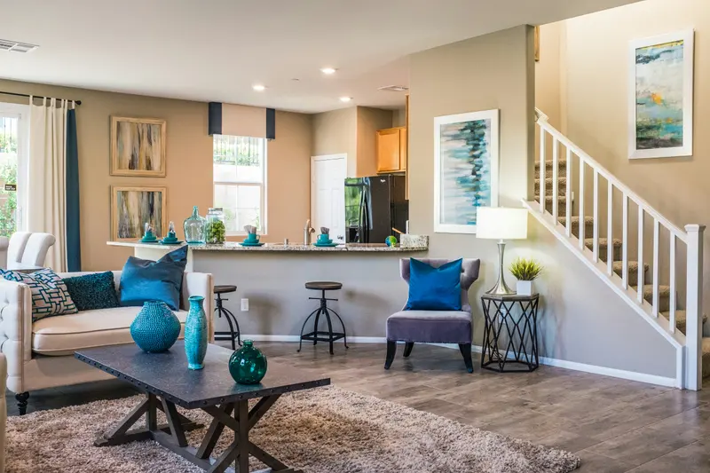 Living room styled with blue accent cushions